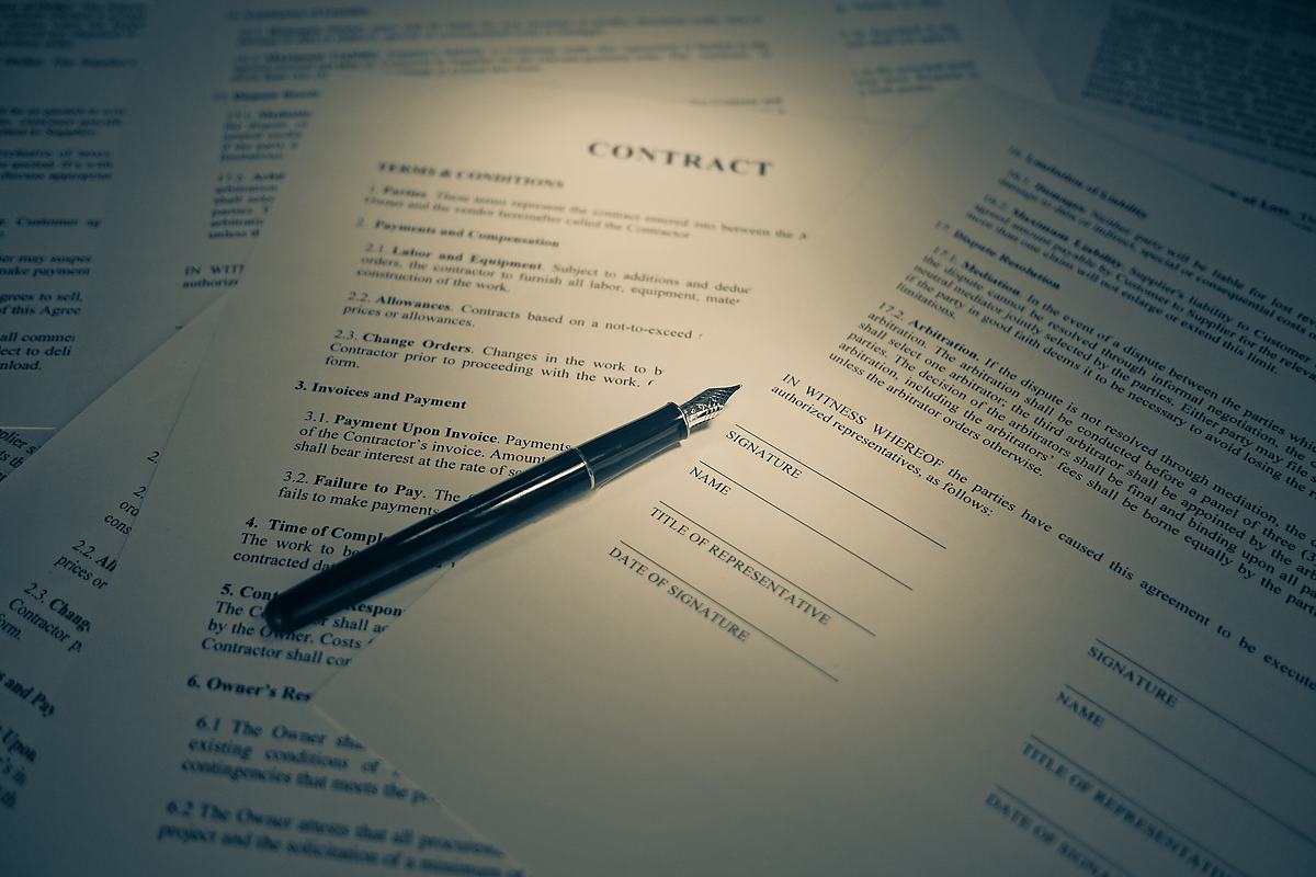 A commercial contract being signed